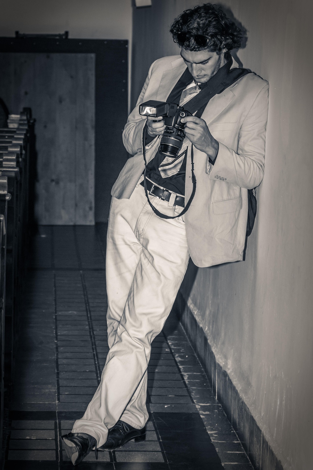 A stylish male model in a casual outfit.